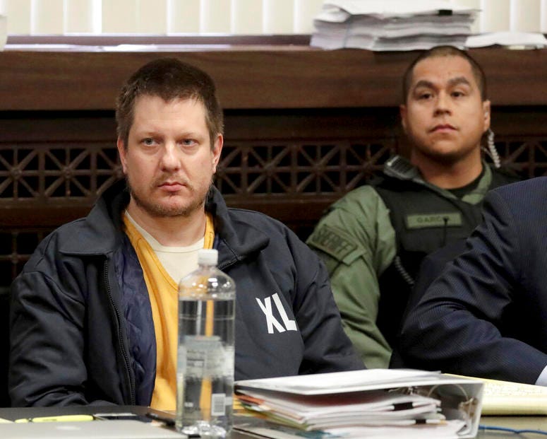 In this Dec. 14, 2018, file photo, former Chicago police Officer Jason Van Dyke, left, appears for a hearing at the Leighton Criminal Court Building, in Chicago. In this Dec. 14, 2018, file photo, former Chicago police Officer Jason Van Dyke, left, appears for a hearing at the Leighton Criminal Court Building, in Chicago.