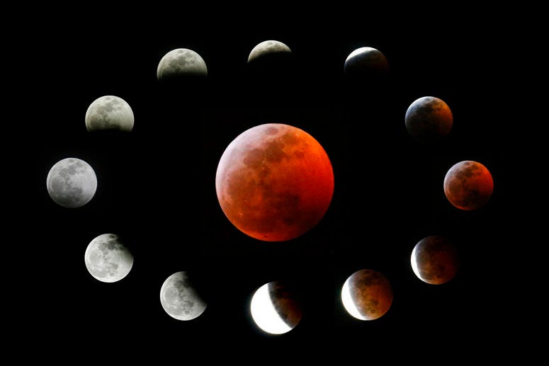 This combination photo shows the totally eclipsed moon, center, and others at the different stages during a total lunar eclipse, as seen from Los Angeles, Sunday, Jan. 20, 2019. The totally eclipsed moon, center, and others at the different stages during a total lunar eclipse, as seen from Los Angeles.