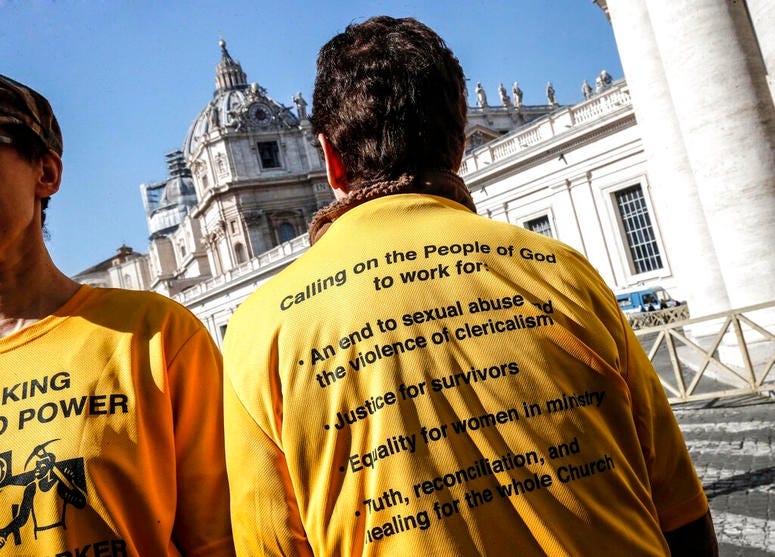 Demonstrators wear shirts as they stand outside St. Peter's Square on the day of the opening of a sex abuse within the Catholic church prevention summit, at the Vatican, Thursday, Feb. 21, 2019. Demonstrators wear shirts as they stand outside St. Peter's Square on the day of the opening of a sex abuse within the Catholic church prevention summit, at the Vatican, Thursday, Feb. 21, 2019.