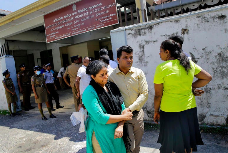 A Sri Lankan couple, whose family member was killed in a yesterday blast, leaves from a mortuary after identifying the body, in Colombo, Sri Lanka, Monday, April 22, 2019. A Sri Lankan couple.
