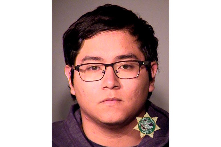This undated photo provided by the Portland, Ore., Police Bureau on Saturday, May 18, 2019 shows Angel Granados Dias, 18. Angel Granados Dias