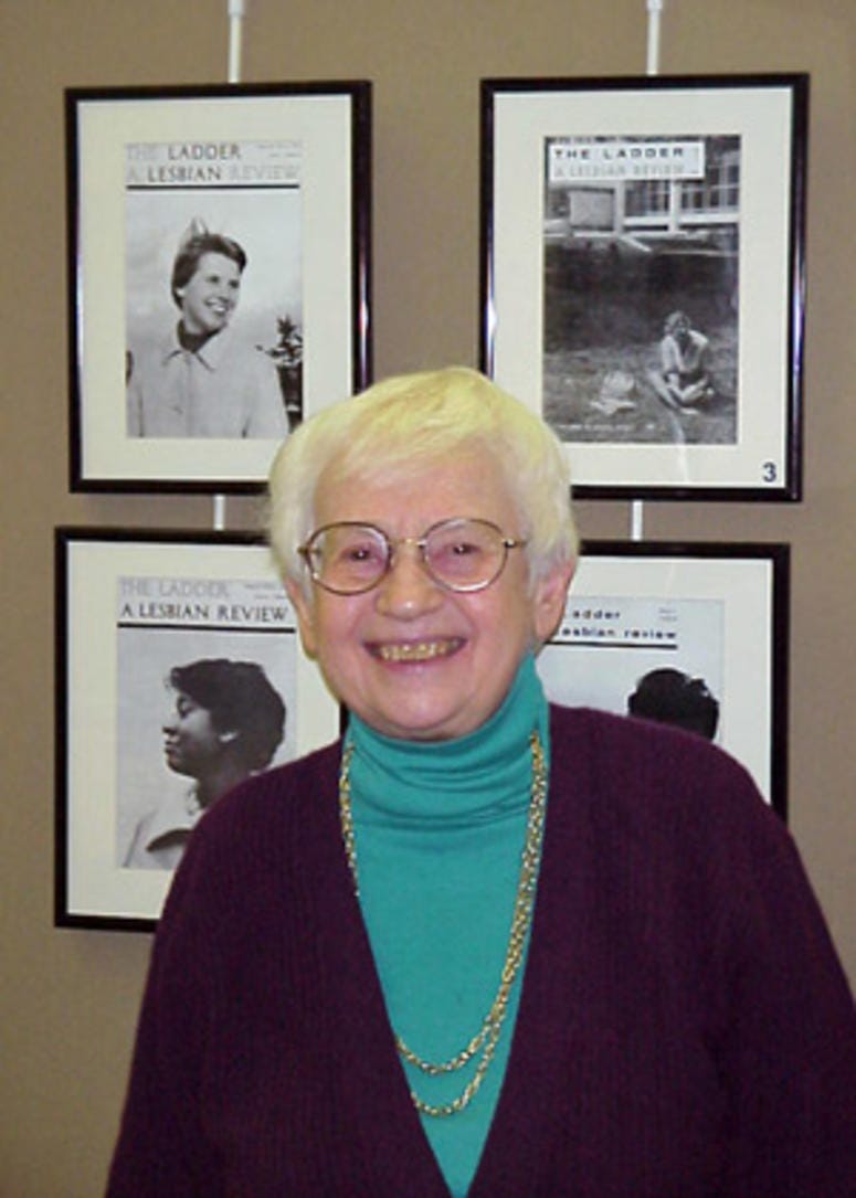 Kay Tobin-Lahusen is shown in front of a collection of her images from the cover of The Ladder. Kay Tobin-Lahusen is shown in front of a collection of her images from the cover of The Ladder.