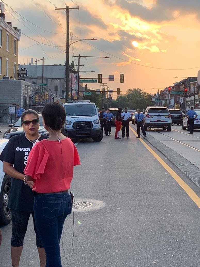 Rosalind Pichardo at the scene of the shooting near Broad St. and Erie Ave. Wednesday evening.