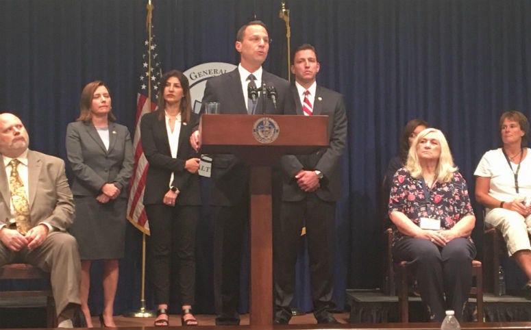 Surrounded by victims, Attorney General Josh Shapiro outlined the grand jury report at a Capitol press conference Tuesday afternoon. Surrounded by victims, Attorney General Josh Shapiro outlined the grand jury report at a Capitol press conference Tuesday afternoon.