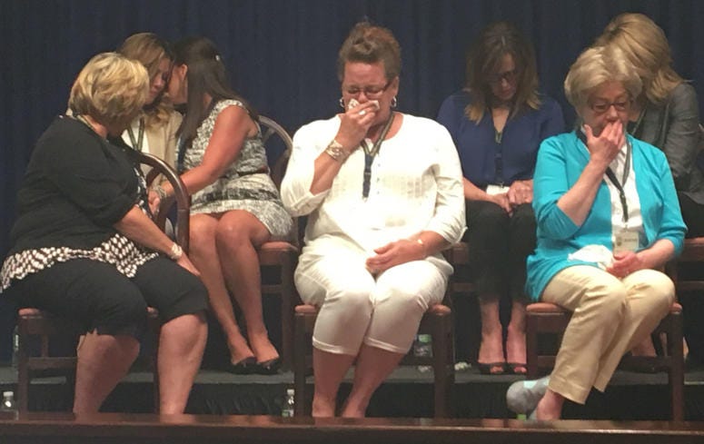 Victims weep as they listen to Attorney General Shapiro outline the grand jury report and a Capitol press conference. Victims weep as they listen to Attorney General Shapiro outline the grand jury report and a Capitol press conference.