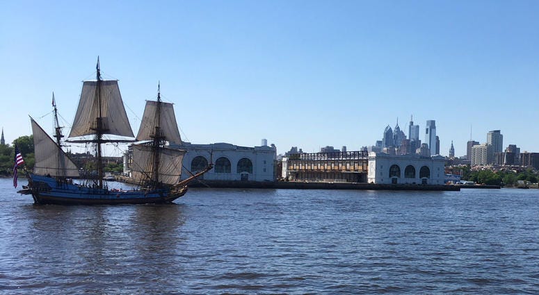 The tall buildings of Center City Philadelphia can be seen in the distance during the Parade of Sail. The tall buildings of Center City Philadelphia can be seen in the distance during the Parade of Sail.
