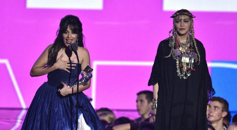 Camila Cabello, left, accepts the award for video of the year as presenter Madonna looks on at the MTV Video Music Awards at Radio City Music Hall on Monday, Aug. 20, 2018, in New York. Camila Cabello, left, accepts the award for video of the year as presenter Madonna looks on at the MTV Video Music Awards at Radio City Music Hall on Monday, Aug. 20, 2018, in New York.