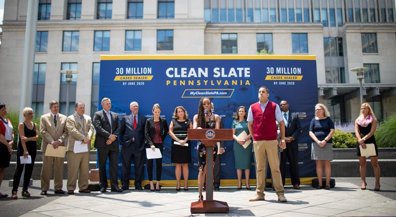 Marilyn (center), who benefits from the Clean Slate law, speaks at a press conference June 28, 2019 in Harrisburg with Gov. Tom Wolf, celebrating the anniversary of Clean Slate becoming law. They plan to seal 30 million criminal records by June 2020. Clean Slate press conference