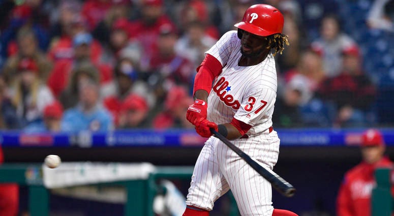 Philadelphia Phillies' Odubel Herrera hits a three-run home run off Atlanta Braves' Julio Teheran during the first inning of a baseball game. Philadelphia Phillies' Odubel Herrera hits a three-run home run off Atlanta Braves' Julio Teheran during the first inning of a baseball game.