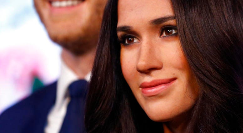 Britain's Prince Harry and his fiancee Meghan Markle are on display as wax figures at Madame Tussauds in London. Britain's Prince Harry and his fiancee Meghan Markle are on display as wax figures at Madame Tussauds in London.