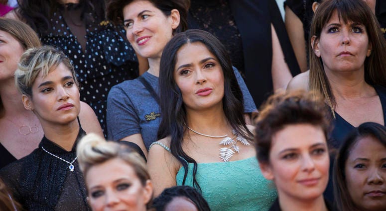 Sofia Boutella, from centre left, Salma Hayek and Patty Jenkins stand as part of 82 film industry professionals on the steps of the Palais des Festivals. Sofia Boutella, from centre left, Salma Hayek and Patty Jenkins stand as part of 82 film industry professionals on the steps of the Palais des Festivals.