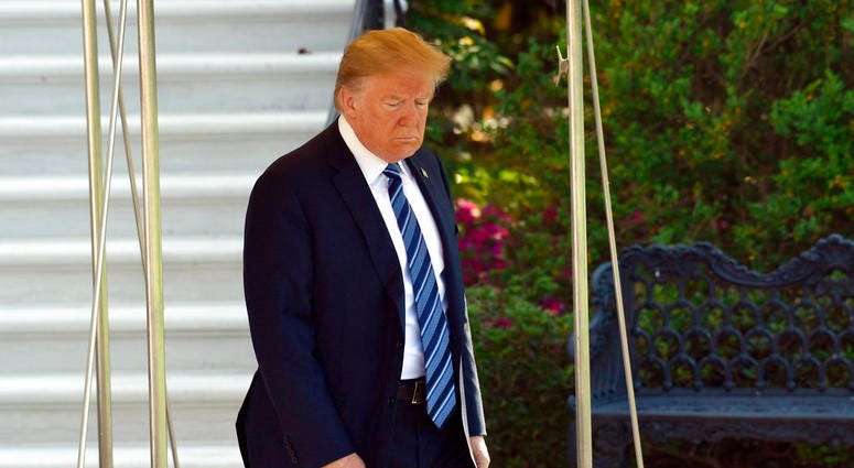 President Donald Trump walks out of the White House in Washington, Friday, May 25, 2018. President Donald Trump