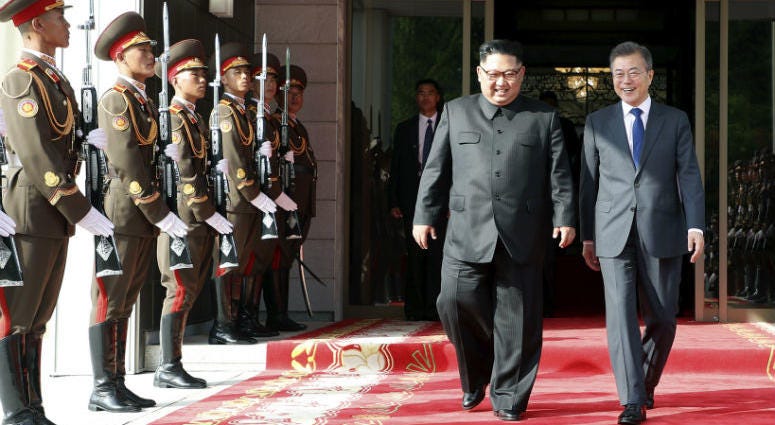 South Korea Presidential Blue House via Yonhap News Agency, North Korean leader Kim Jong Un, center left, and South Korean President Moon Jae-in, right, walk after their meeting at the northern side of Panmunjom in North Korea. South Korea Presidential Blue House via Yonhap News Agency, North Korean leader Kim Jong Un, center left, and South Korean President Moon Jae-in, right, walk after their meeting at the northern side of Panmunjom in North Korea.