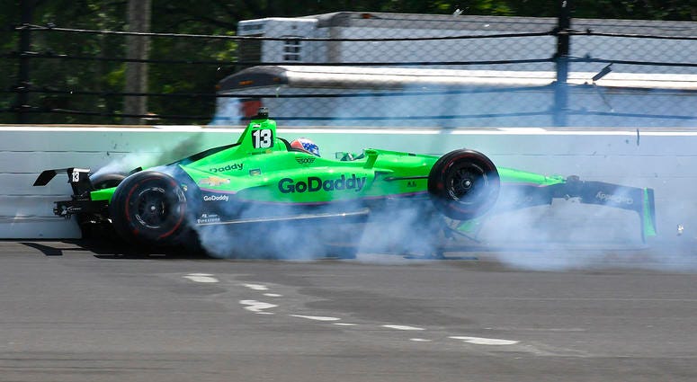 Danica Patrick hits the wall in the second turn during the running of the Indianapolis 500 auto race at Indianapolis Motor Speedway. Danica Patrick hits the wall in the second turn during the running of the Indianapolis 500 auto race at Indianapolis Motor Speedway.