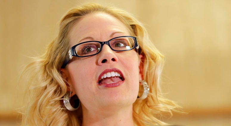 U.S. Rep. Kyrsten Sinema, D-Ariz. speaks prior to delivering her signatures to the Arizona Secretary of State's office. U.S. Rep. Kyrsten Sinema, D-Ariz. speaks prior to delivering her signatures to the Arizona Secretary of State's office.