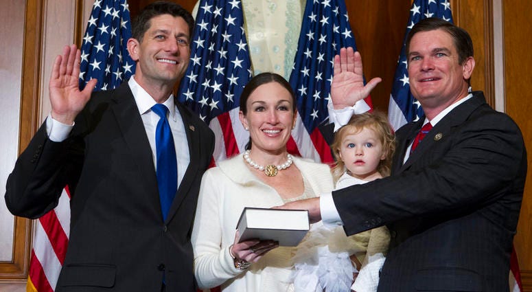 House Speaker Paul Ryan of Wis. administers the House oath of office to Rep. Austin Scott, R-Ga., during a mock swearing in ceremony on Capitol Hill in Washington. House Speaker Paul Ryan of Wis. administers the House oath of office to Rep. Austin Scott, R-Ga., during a mock swearing in ceremony on Capitol Hill in Washington.