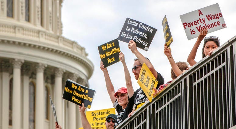 Demonstrators with the Poor People's Campaign await processing by U.S. Capitol Police after being peacefully arrested at the Capitol. Demonstrators with the Poor People's Campaign await processing by U.S. Capitol Police after being peacefully arrested at the Capitol.