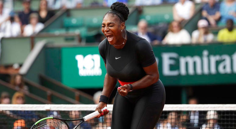 In this May 29, 2018 file photo, Serena Williams of the U.S. clenches her fist after scoring a point against Krystina Pliskova of the Czech Republic during their first round match of the French Open tennis tournament at the Roland Garros stadium. Serena Williams