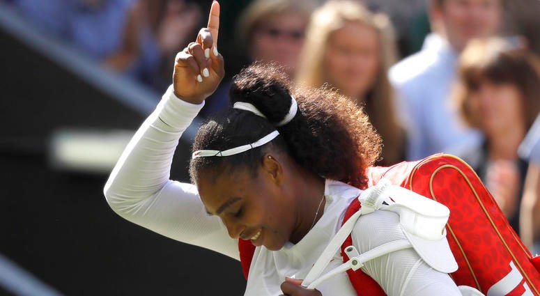 Serena Williams of the United States celebrates winning her women's singles quarterfinals match against Italy's Camila Giorgi, at the Wimbledon Tennis Championships, in London, Tuesday July 10, 2018. Serena Williams of the United States celebrates winning her women's singles quarterfinals match against Italy's Camila Giorgi, at the Wimbledon Tennis Championships, in London, Tuesday July 10, 2018.