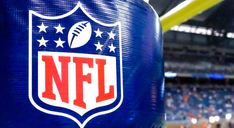 This Aug. 9, 2014 file photo shows an NFL logo on a goal post pad before a preseason NFL football game between the Detroit Lions and the Cleveland Browns at Ford Field in Detroit. NFL logo