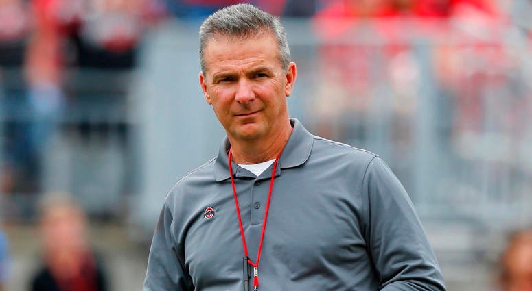 In this April 14, 2018, file photo, Ohio Setate coach Urban Meyer watches the NCAA college football team's spring game in Columbus, Ohio. Urban Meyer