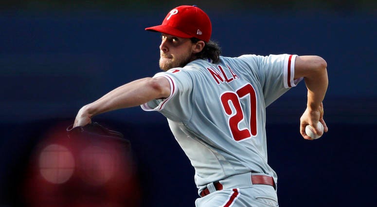 Philadelphia Phillies starting pitcher Aaron Nola works against a San Diego Padres batter during the first inning. Philadelphia Phillies starting pitcher Aaron Nola