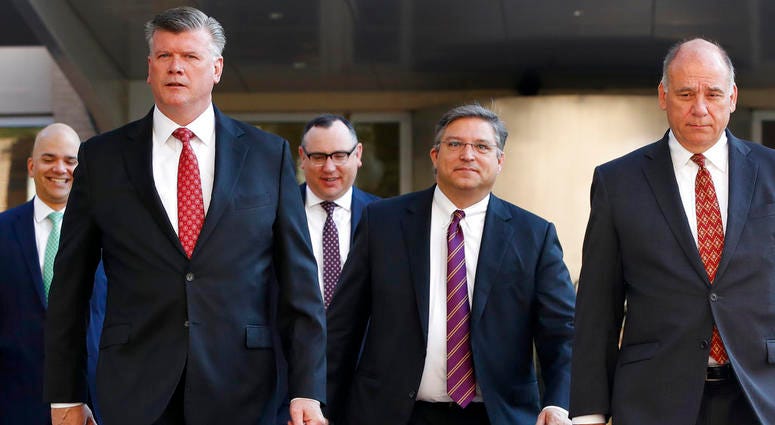 Members of the defense team for Paul Manafort, including from left, Jay Nanavati, Kevin Downing, Brian Ketcham, Richard Westling, and Thomas Zehnle, walk to federal court as the trial of the former Trump campaign chairman continues. Members of the defense team for Paul Manafort, including from left, Jay Nanavati, Kevin Downing, Brian Ketcham, Richard Westling, and Thomas Zehnle, walk to federal court as the trial of the former Trump campaign chairman continues.