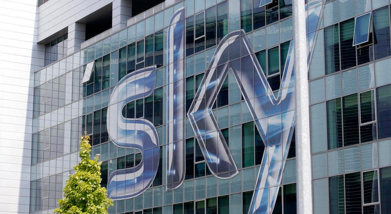 This Friday, July 25, 2014, file photo shows a view of the headquarters of the Italian Sky television broadcaster in Milan, Italy. Headquarters of the Italian Sky television broadcaster