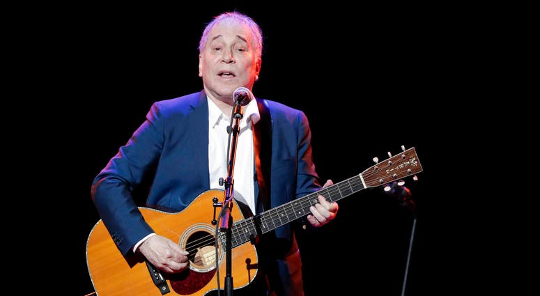 In a Sept. 22, 2016 file photo, musician Paul Simon performs during the Global Citizen Festival, in New York. Simon wraps up his farewell concert tour Saturday, Sept. 22, 2018 at a park in Queens, a bicycle ride across the borough from where he grew up.