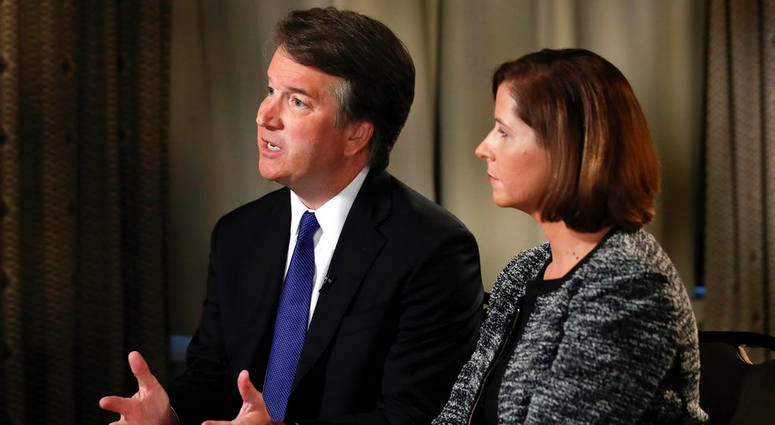 Brett Kavanaugh, with his wife Ashley Estes Kavanaugh, answers questions during a FOX News interview, Monday, Sept. 24, 2018, in Washington, about allegations of sexual misconduct against the Supreme Court nominee Brett Kavanaugh, with his wife Ashley Estes Kavanaugh, answers questions during a FOX News interview, Monday, Sept. 24, 2018, in Washington, about allegations of sexual misconduct against the Supreme Court nominee