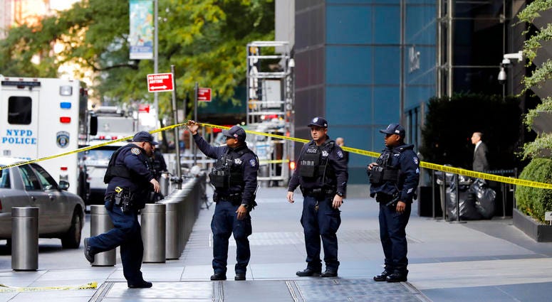 New York City Police Dept. officers arrive outside the Time Warner Center, in New York, Wednesday, Oct. 24, 2018. A police bomb squad was sent to CNN's offices in New York City and the newsroom was evacuated because of a suspicious package. (AP Photo/Rich Pipe bombs target Democrats