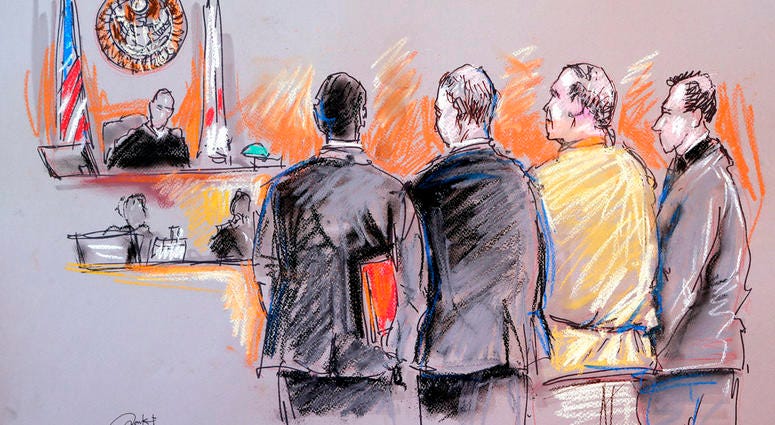 In this courtroom sketch, Cesar Sayoc, second from right, appears in federal court, Monday, Oct. 29, 2018, in Miami. Cesar Sayoc appears in court.