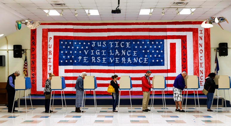 Voters cast their ballots at Robious Elementary School in Chesterfield, Va., on Tuesday, November 6, 2018. Voters cast their ballots at Robious Elementary School in Chesterfield, Va., on Tuesday, November 6, 2018.