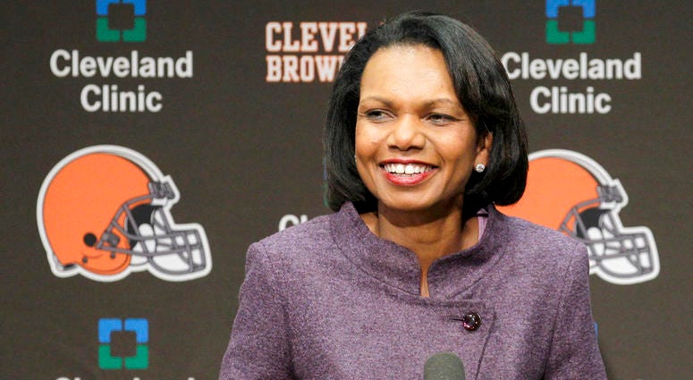 FILE- In this Oct. 21, 2010, file photo former Secretary of State Condoleezza Rice talks with the media after visiting with the Cleveland Browns coaches and players at the Browns training facility in Berea, Ohio. FILE- In this Oct. 21, 2010, file photo former Secretary of State Condoleezza Rice talks with the media after visiting with the Cleveland Browns coaches and players at the Browns training facility in Berea, Ohio.