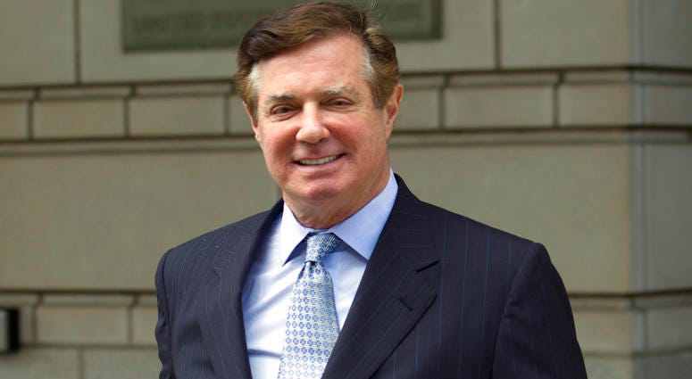 FILE - In this May 23, 2018, file photo, Paul Manafort, President Donald Trump's former campaign chairman, leaves the Federal District Court after a hearing, in Washington. FILE - In this May 23, 2018, file photo, Paul Manafort, President Donald Trump's former campaign chairman, leaves the Federal District Court after a hearing, in Washington.