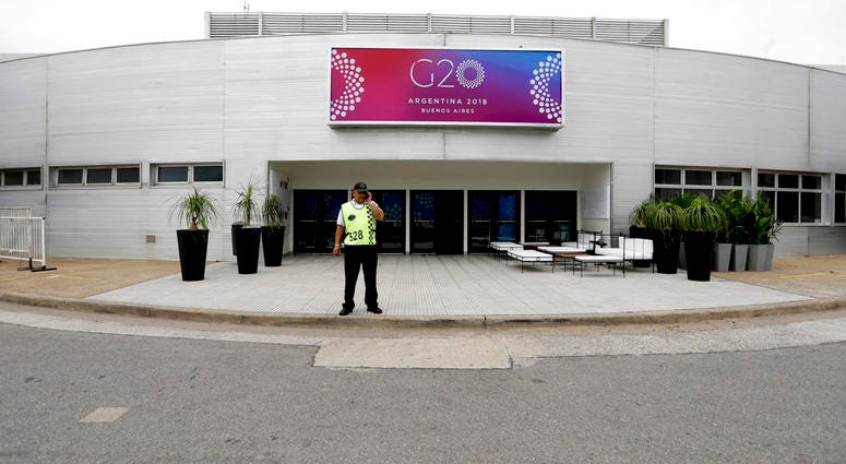 A security guard stands outside the G20 summit venue at the Costa Salguero Center, Buenos Aires, Argentina, Tuesday, Nov. 27, 2018. A security guard stands outside the G20 summit venue at the Costa Salguero Center, Buenos Aires, Argentina, Tuesday, Nov. 27, 2018.
