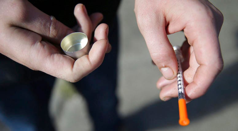 A fentanyl user holds a needle near Kensington and Cambria in Philadelphia. Suicides and drug overdoses helped lead a surge in U.S. deaths last year, and drove a continuing decline in how long Americans are expected to live. A fentanyl user holds a needle near Kensington and Cambria in Philadelphia. Suicides and drug overdoses helped lead a surge in U.S. deaths last year, and drove a continuing decline in how long Americans are expected to live.