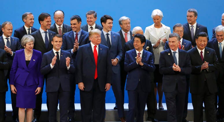 World leaders gather for a group photo at the start of the G20 Leader's Summit at the Costa Salguero Center in Buenos Aires, Argentina. G-20 Summit
