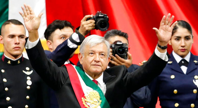 Mexico's new President Andres Manuel Lopez Obrador greets the crowd at the end of his inaugural ceremony at the National Congress in Mexico City, Saturday, Dec. 1, 2018. Mexico's new President Andres Manuel Lopez Obrador greets the crowd at the end of his inaugural ceremony at the National Congress in Mexico City, Saturday, Dec. 1, 2018.