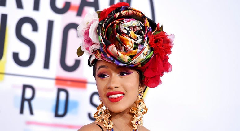 In this Oct. 9, 2018, file photo, Cardi B arrives at the American Music Awards, at the Microsoft Theater in Los Angeles. Cardi B