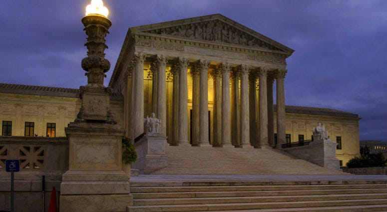 In this Oct. 5, 2018 photo the U. S. Supreme Court building stands quietly before dawn in Washington. In this Oct. 5, 2018 photo the U. S. Supreme Court building stands quietly before dawn in Washington.
