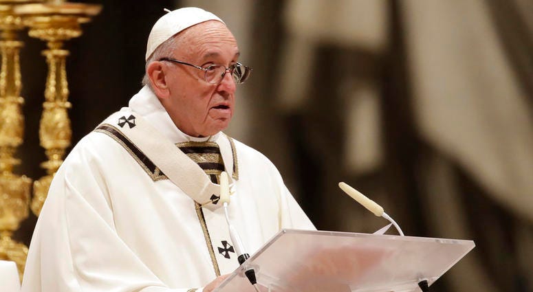 Pope Francis delivers his message as he celebrates the Christmas Eve Mass in St. Peter's Basilica at the Vatican, Monday, Dec. 24, 2018. Pope Francis