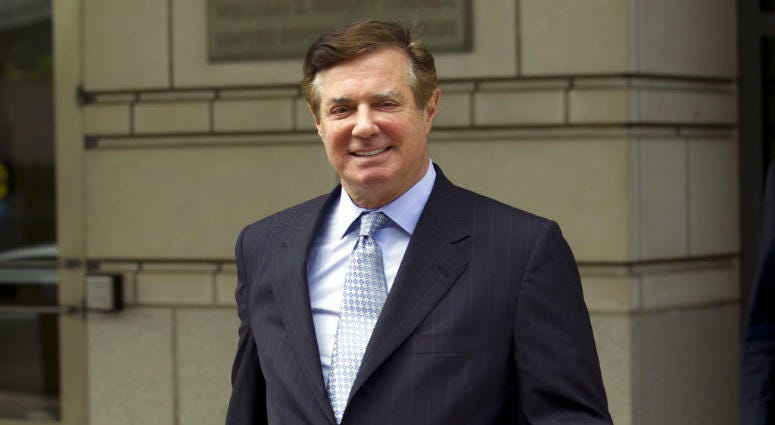 FILE - In this May 23, 2018, file photo, Paul Manafort, President Donald Trump's former campaign chairman, leaves the Federal District Court after a hearing in Washington. FILE - In this May 23, 2018, file photo, Paul Manafort, President Donald Trump's former campaign chairman, leaves the Federal District Court after a hearing in Washington.