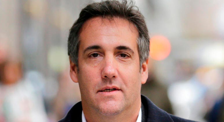 In this April 11, 2018, file photo, Michael Cohen, President Donald Trump's former attorney, walks along a sidewalk in New York. Michael Cohen