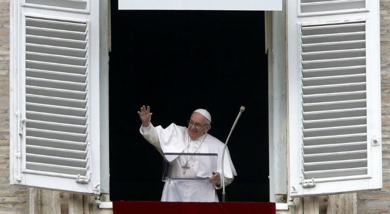 Pope Francis salutes the crowd as he recites the Angelus noon prayer from the window of his studio overlooking St.Peter's Square, at the Vatican, Sunday, Jan. 13, 2019. Pope Francis salutes the crowd as he recites the Angelus noon prayer from the window of his studio overlooking St.Peter's Square, at the Vatican, Sunday, Jan. 13, 2019.