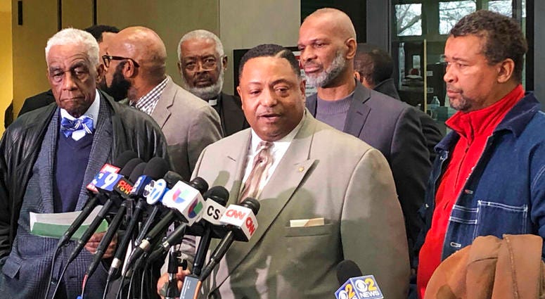 Rev. Marvin Hunter speaks to reporters after a judge acquitted three Chicago police officers of trying to cover up the 2014 shooting of black teenager Laquan McDonald, Thursday, Jan. 17, 2019, in Chicago. Rev. Marvin Hunter speaks to reporters after a judge acquitted three Chicago police officers of trying to cover up the 2014 shooting of black teenager Laquan McDonald, Thursday, Jan. 17, 2019, in Chicago.