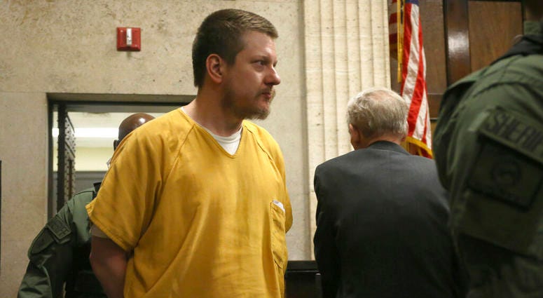 Former Chicago police Officer Jason Van Dyke and his attorney Daniel Herbert listen during Van Dyke's sentencing hearing at the Leighton Criminal Court Building, Friday, Jan. 18, 2019, in Chicago. Jason Van Dyke