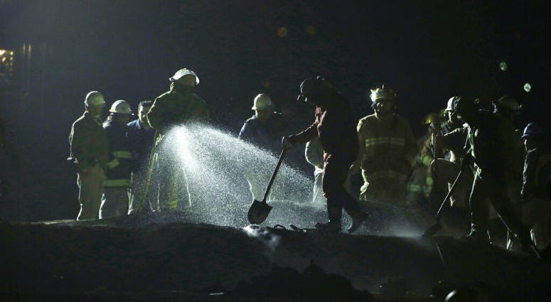 Staff of Pemex, Petroleos Mexicanos, works the area of a oil pipeline explosion in Tlahuelilpan, Hidalgo state, Mexico, Saturday, Jan. 19, 2019. Staff of Pemex, Petroleos Mexicanos, works the area of a oil pipeline explosion in Tlahuelilpan, Hidalgo state, Mexico, Saturday, Jan. 19, 2019.