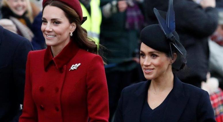 FILE - In this Tuesday, Dec. 25, 2018 file photo, Britain's Kate, Duchess of Cambridge, left, and Meghan, Duchess of Sussex arrive to attend the Christmas day service at St Mary Magdalene Church in Sandringham in Norfolk, England.