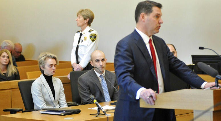 Michelle Carter, 22, second left, appears in Taunton District Court in Taunton, Mass. Monday, February 11, 2019 for a hearing on her prison sentence as lawyer Joe Cataldo speaks at the podium. Michelle Carter, 22, second left, appears in Taunton District Court in Taunton, Mass. Monday, February 11, 2019 for a hearing on her prison sentence as lawyer Joe Cataldo speaks at the podium.